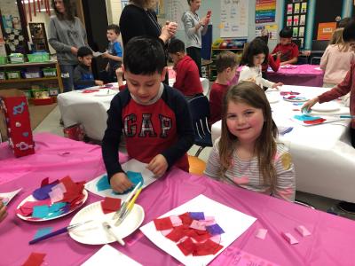 students create valentine craft